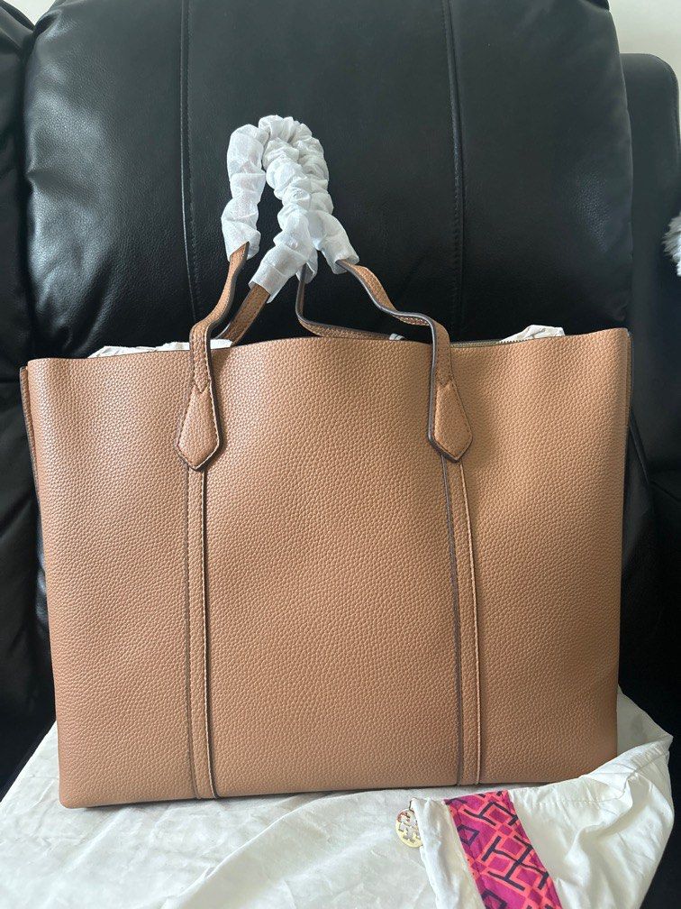 Tory Burch Perry Canvas Triple-Compartment Tote (Category: Luxury Bags & Wallets) located in Pasig City. Submitted by TheApparels_ph (Listing ID 1387202317, Image 2). Description: COLOUR: Light Umber/Brown MATERIAL: Pebbled Leather SIZE: L36 X W13.5 X H29 (CM)/ LARGE * Series : PERRY TRIPLE-COMPARTMENT TOTE.