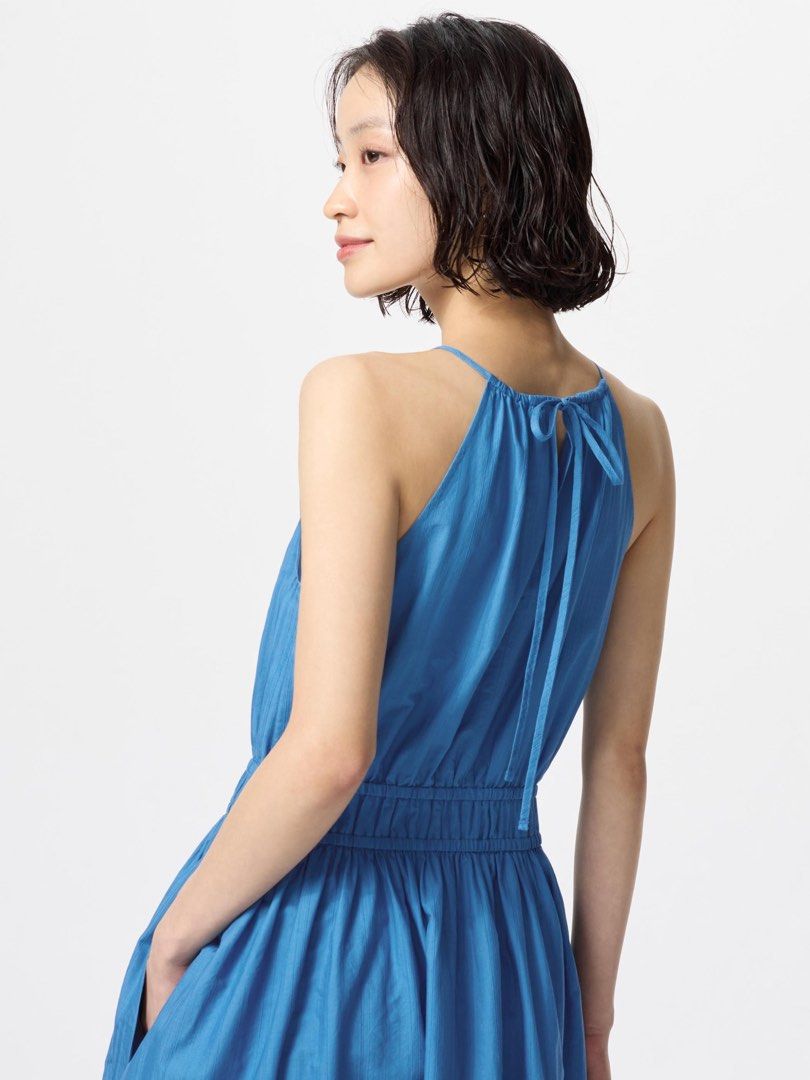 Uniqlo black halter dress (Category: Dresses) located in Makati City. Submitted by solana36 (Listing ID 1387262013, Image 3). Description: new with tag size small garterized waist, strap can be adjusted at the back RFS: decluttering sf c/o buyer, I can ship via J&T location: East Rembo, Taguig .