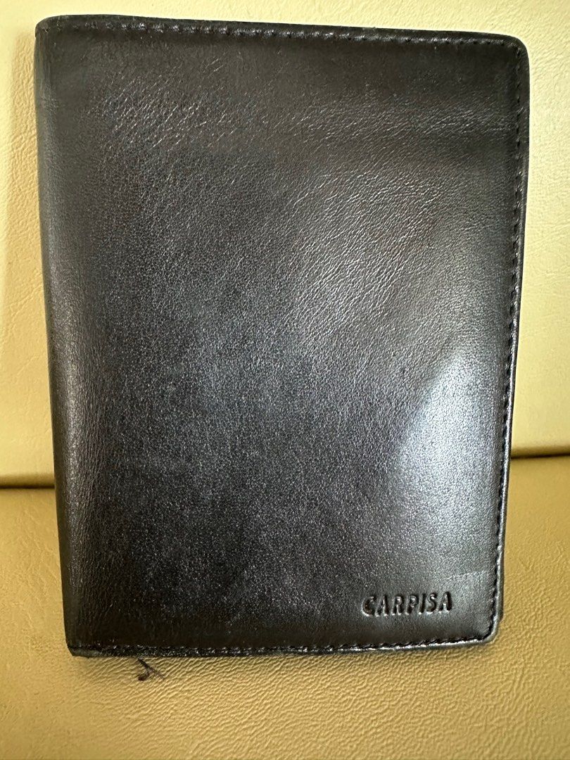 Carpisa Italian made wallet (Category: Luxury Bags & Wallets) located in Baliuag. Submitted by kim01270048729 (Listing ID 1387358804, Image 1). Description: Almost new Black Carpisa ( italian leather ) wallet . Has 2 slots for photos , 9 card slots , coin pocket , bill slot. .