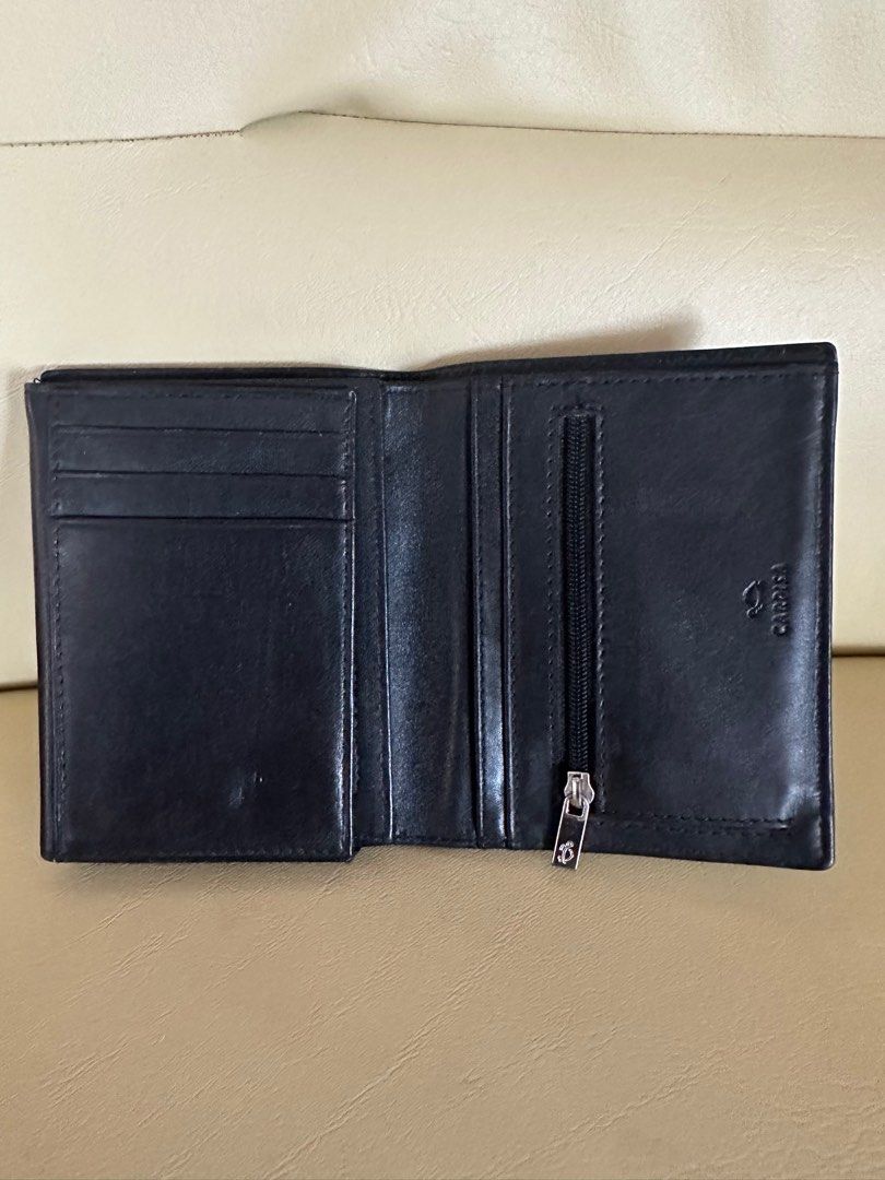 Carpisa Italian made wallet (Category: Luxury Bags & Wallets) located in Baliuag. Submitted by kim01270048729 (Listing ID 1387358804, Image 2). Description: Almost new Black Carpisa ( italian leather ) wallet . Has 2 slots for photos , 9 card slots , coin pocket , bill slot. .