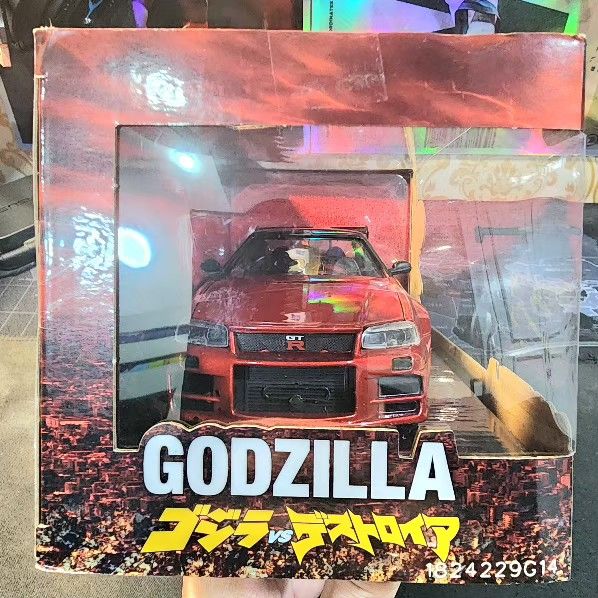 Godzilla 2002 Nissan Skylune GTR (Category: Vehicle & Diecast Models) located in Taguig. Submitted by selleremperor88 (Listing ID 1387529831, Image 3). Description: Brand Jada R34 Godzilla Die Cast not been open.