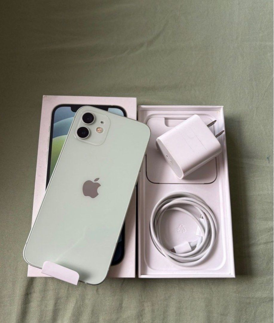 Iphone 12 green (Category: iPhone 12 Series) located in Manila. Submitted by beeeyah (Listing ID 1387522080, Image 1). Description: Preloved selling my Iphone 12 green 256 gb (nego) •71% batt health •NTC approved/ Any sim •Front and back camera still clean and working •89% smoothness- small dents and sratches but not noticeable •no issue with internal •no repair history comes with original box (wala akong extra charger) .