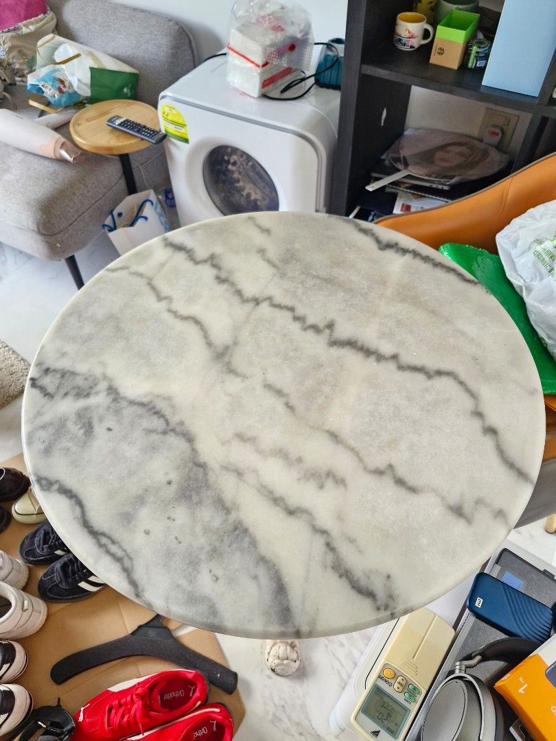 Marble Top Round Table (Category: Tables & Sets) located in Singapore. Submitted by lyly21 (Listing ID 1387380452, Image 3). Description: - Elegant side table - Beautiful marble top (approx. 60cm diameter) - About 70cm tall - Unique base design - Suitable for living room or bedroom - Great condition - Minor signs of use.