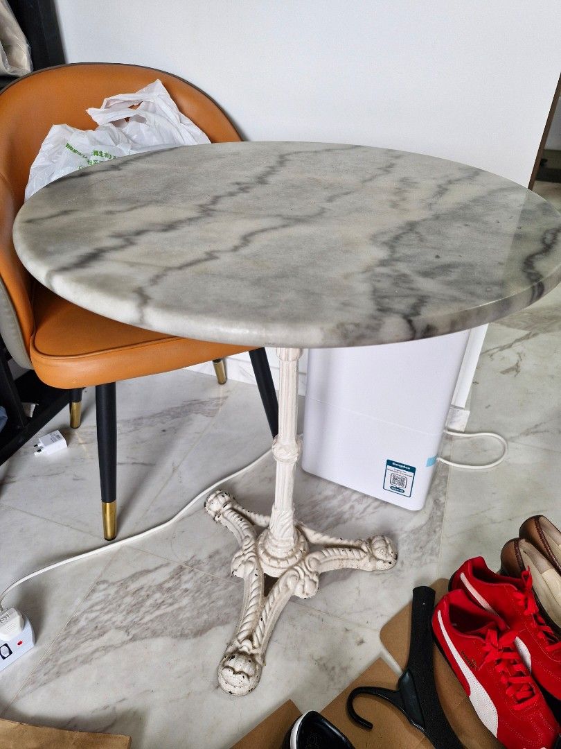 Marble Top Round Table (Category: Tables & Sets) located in Singapore. Submitted by lyly21 (Listing ID 1387380452, Image 2). Description: - Elegant side table - Beautiful marble top (approx. 60cm diameter) - About 70cm tall - Unique base design - Suitable for living room or bedroom - Great condition - Minor signs of use.