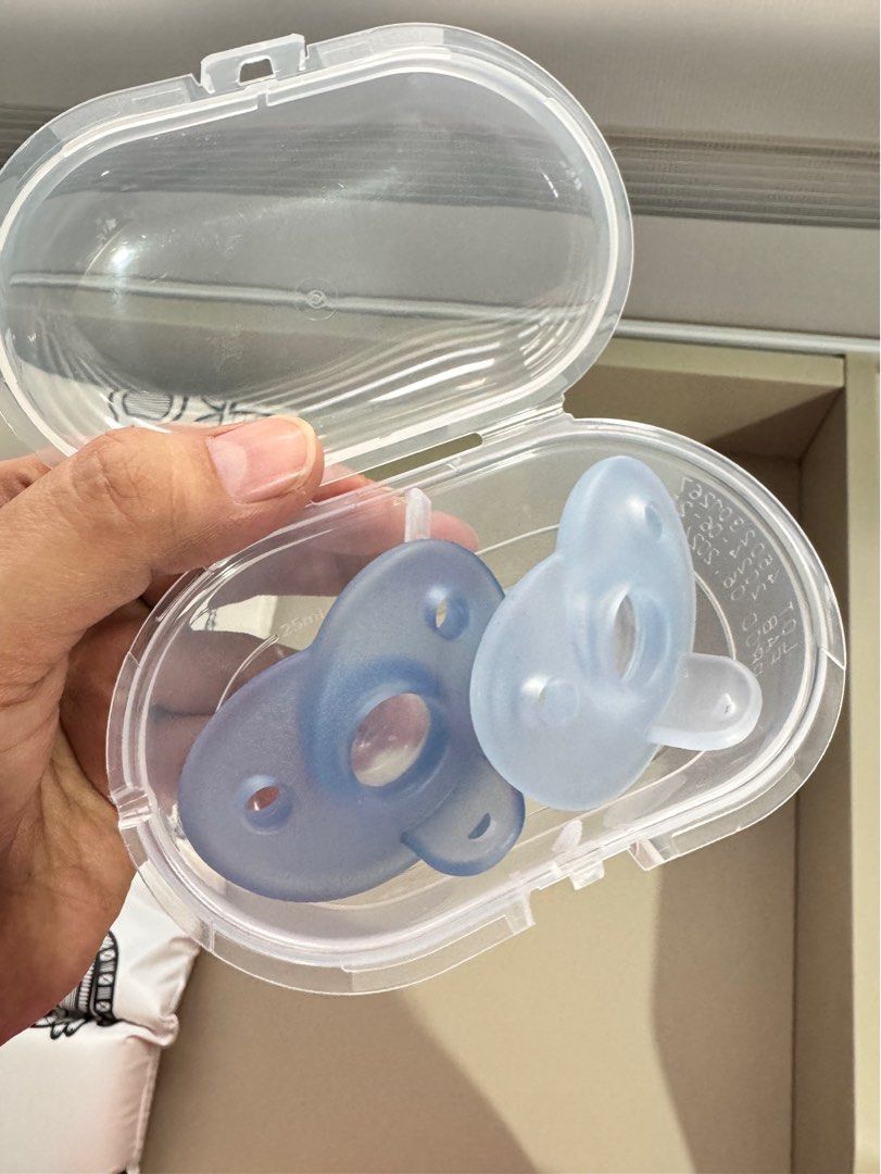 Philips Avent Soothie/Pacifier (Category: Soothers & Pacifiers) located in Pasig City. Submitted by 90skidsph (Listing ID 1387453822, Image 2). Description: For Sale : Philips Avent Soothie/Pacifier Color : Clear & Blue Price : 750 Php (Slightly nego) Sold as set - 2 pcs soothie and a carry case. Bought this in Mothercare for 999 PhP. Tested only. Can pass as brand new. Can be sterilized in the microwave just need to add small amount of water in 