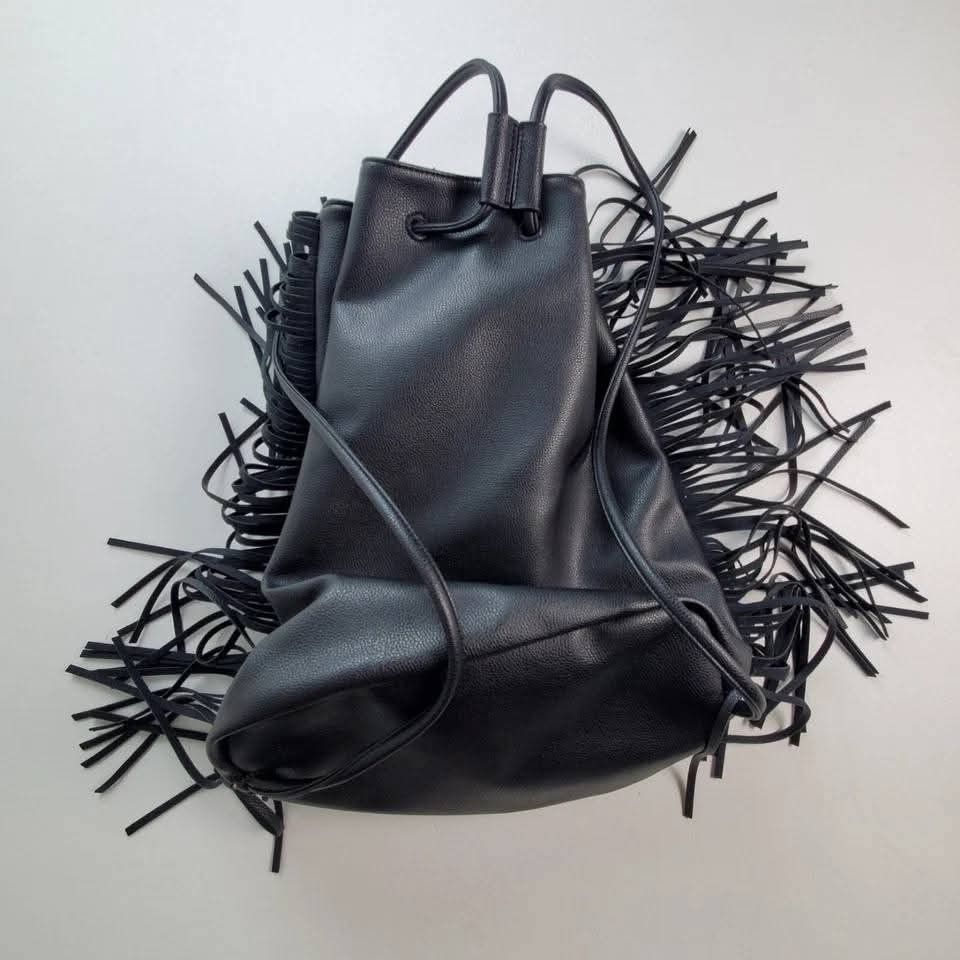 Victoria Secret Backpack (Category: Backpacks) located in Manila. Submitted by maria28isabelle (Listing ID 1387512567, Image 3). Description: Victoria’s Secret faux leather black fringe tassel backpack purse bag Php 1,500.00 only No flaws. Excellent condition. Mode of payment: Gcash/BDO Delivery via LBC.