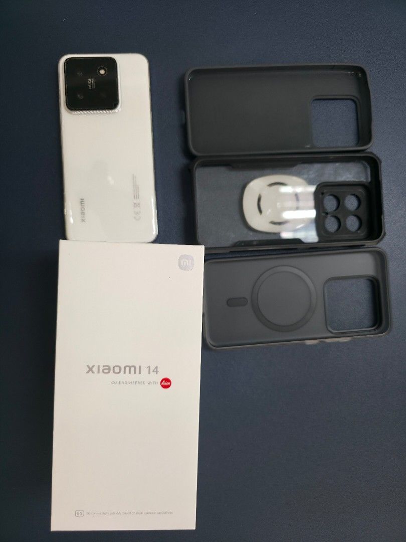 Xiaomi 14 12/512gb NTC (Category: Xiaomi) located in Manila. Submitted by voxbjun (Listing ID 1387359671, Image 1). Description: Swap or sale to gaming phone. Complete with box. In prestine condition..