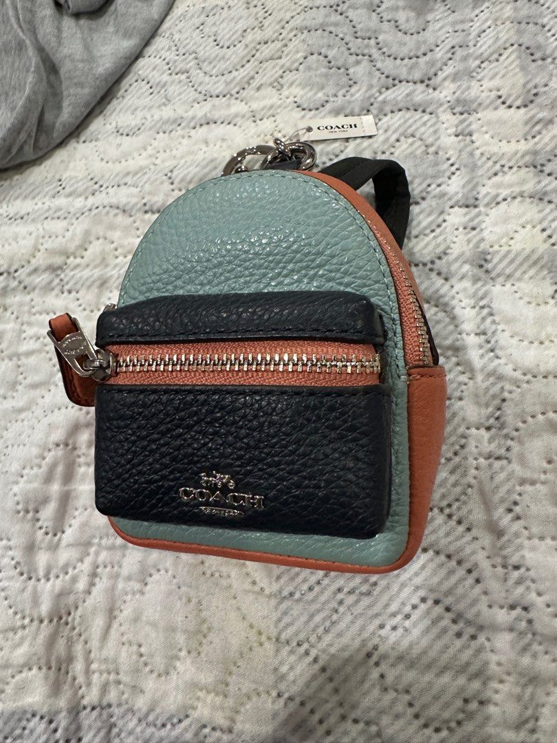 Authentic Coach mini backpack keychain (Category: Luxury Bags & Wallets) located in Pasig City. Submitted by sandy120913 (Listing ID 1387664242, Image 1). Description: Authentic Coach backpack bag charm/ coin purse.