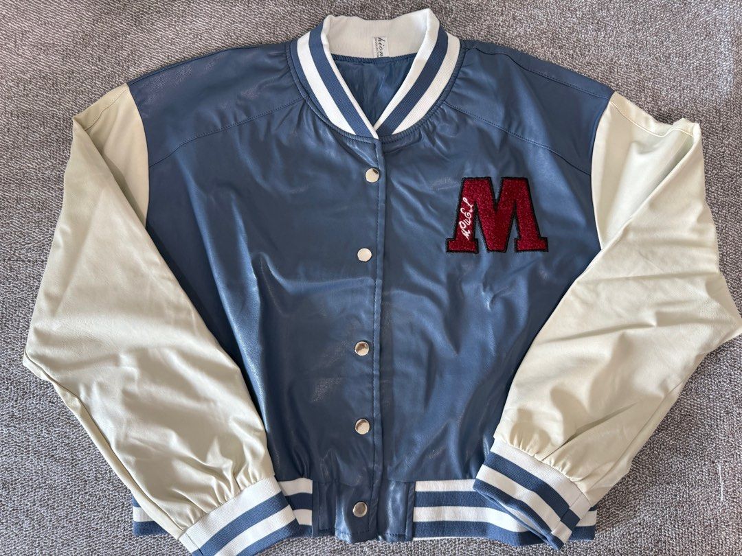 Blue Varsity Jacket M 5 Design (Category: Coats, Jackets and Outerwear) located in Quezon City. Submitted by gianncoded (Listing ID 1387586647, Image 2). Description: Chest Circumference: 120 cm Shoulder Width: 57 cm Clothes Length: 52 cm.