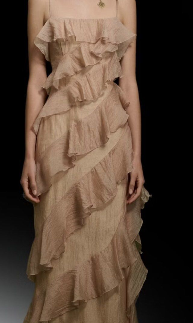 Brown Layer Silk Dress Gown (Category: Evening dresses & gowns) located in Makati City. Submitted by cshells9 (Listing ID 1387567363, Image 3). Description: Beige ruffle gown Asymmetrical layered dress Elegant evening gown Formal dress with ruffles Wedding guest gown Long flowy dress Chic formal wear Same day delivery. Waistline: 26-28.