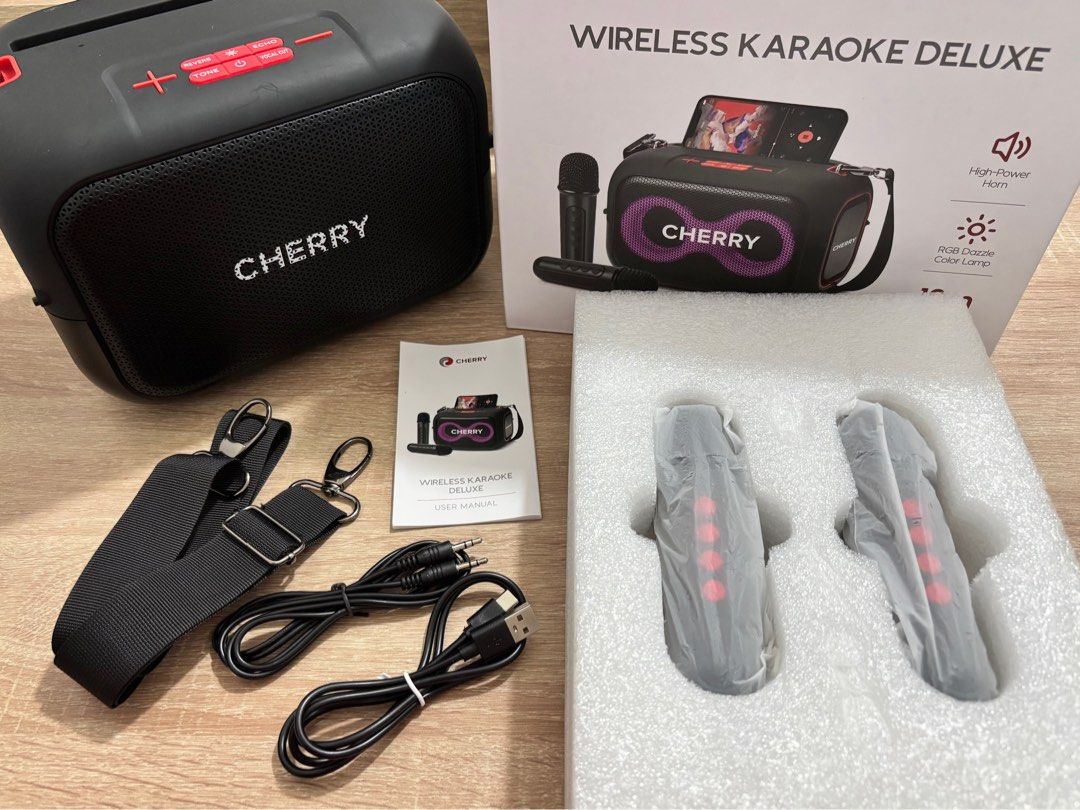 Cherry Wireless Karaoke Deluxe (Category: Soundbars, Speakers & Amplifiers) located in Silang. Submitted by onatebeah (Listing ID 1387725193, Image 2). Description: Authentic, good as new, and in excellent condition. It has minimal scratches from light use, but nothing that affects performance. Comes with the original box and complete accessories..