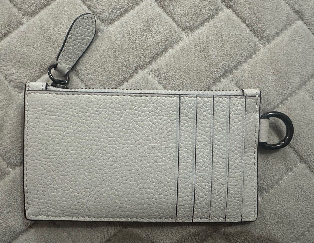 COACH ZIP CARD CASE WITH VARSITY MOTIF WHITE (Category: Purses & Pouches) located in Quezon City. Submitted by jaaaane (Listing ID 1387693631, Image 2). Description: Coach Zip Card Case Bought in Japan (almost 8K) Used only twice Inclusion: dustbag only RFS: Decluttering.