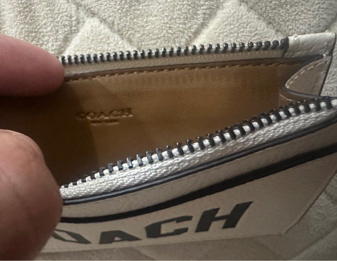 COACH ZIP CARD CASE WITH VARSITY MOTIF WHITE (Category: Purses & Pouches) located in Quezon City. Submitted by jaaaane (Listing ID 1387693631, Image 3). Description: Coach Zip Card Case Bought in Japan (almost 8K) Used only twice Inclusion: dustbag only RFS: Decluttering.