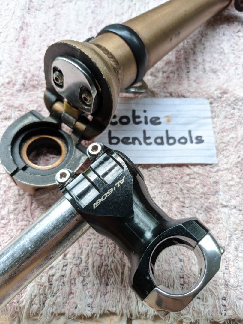 Dahon Bike Folding Stem (Category: Bicycles) located in Quezon City. Submitted by praxxis (Listing ID 1387631265, Image 3). Description: Dahon Bike Folding Stem READING IS ESSENTIAL! Available unless marked as SOLD!!! Needs to replace one allen screw (bottom screw in the last picture) and/or "square block" (already had crack). With generic 60mm 0° standard-to-standard (25.4-to-25.4) size stem. ₱598.00 Please see ALL the pictures to appreciate. It