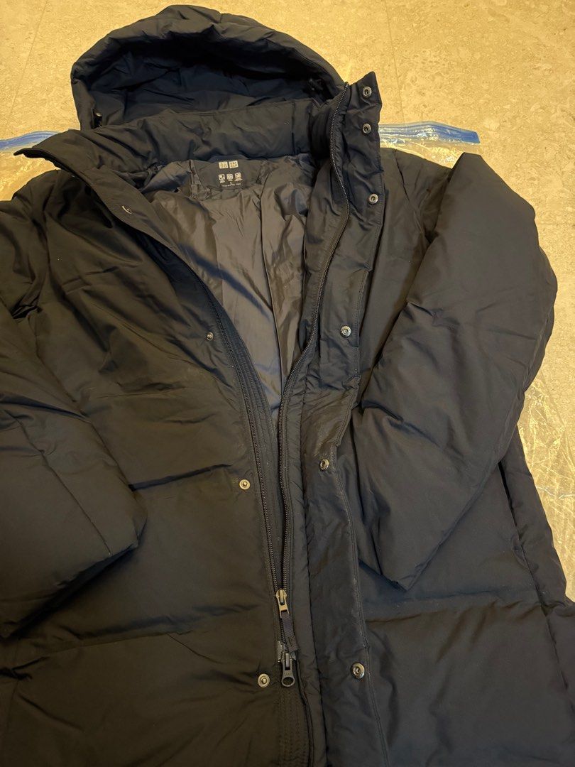 Down feather jacket (Category: Coats, Jackets and Outerwear) located in Singapore. Submitted by chinck80 (Listing ID 1273379315, Image 4). Description: Down feather jacket and worn only thrice and dry-clean, as good as new. Can withstand winter weather coupled with layering, tested out in Greece, Melbourne and Poland, the temperature is around - 3 Degree Celsius. This price is a great mark-down from original price, best deal you can get! RFS: Nee
