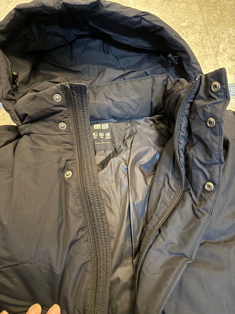 Down feather jacket (Category: Coats, Jackets and Outerwear) located in Singapore. Submitted by chinck80 (Listing ID 1273379315, Image 3). Description: Down feather jacket and worn only thrice and dry-clean, as good as new. Can withstand winter weather coupled with layering, tested out in Greece, Melbourne and Poland, the temperature is around - 3 Degree Celsius. This price is a great mark-down from original price, best deal you can get! RFS: Nee