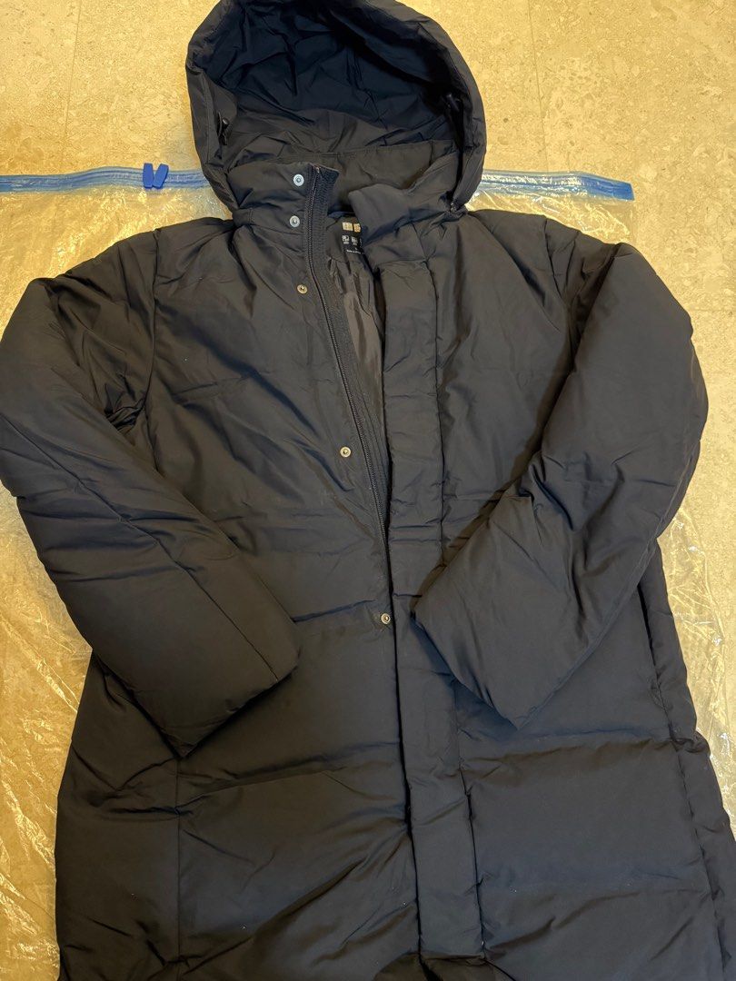 Down feather jacket (Category: Coats, Jackets and Outerwear) located in Singapore. Submitted by chinck80 (Listing ID 1273379315, Image 5). Description: Down feather jacket and worn only thrice and dry-clean, as good as new. Can withstand winter weather coupled with layering, tested out in Greece, Melbourne and Poland, the temperature is around - 3 Degree Celsius. This price is a great mark-down from original price, best deal you can get! RFS: Nee