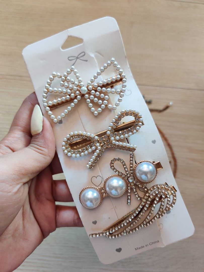 Hair pins and others (Category: Accessory Holder, Box & Organizers) located in Apalit. Submitted by daintynyla (Listing ID 1387600892, Image 2). Description: - The set of hairpins are never used. used carefully - Bracelets are adjustable - pear necklace chocker.