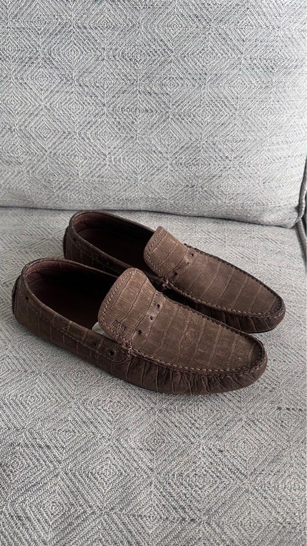 Hugo boss Crocodle soft shoes (Category: Casual Shoes) located in Makati City. Submitted by patrickkkk22 (Listing ID 1387620896, Image 1). Description: Bought it for 28,400 at greenbelt hugo boss Selling for 12,000 2x lang nagamit Size 7.5 Best Fit 9-9.5.