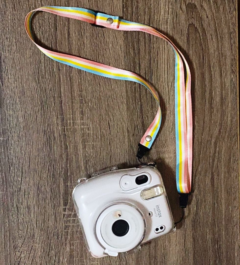 Instax Mini 11 White with Case, strap & 7 unused films (Category: Cameras) located in Mandaue City. Submitted by twylainavani (Listing ID 1387568064, Image 1). Description: Message me for more questions. .