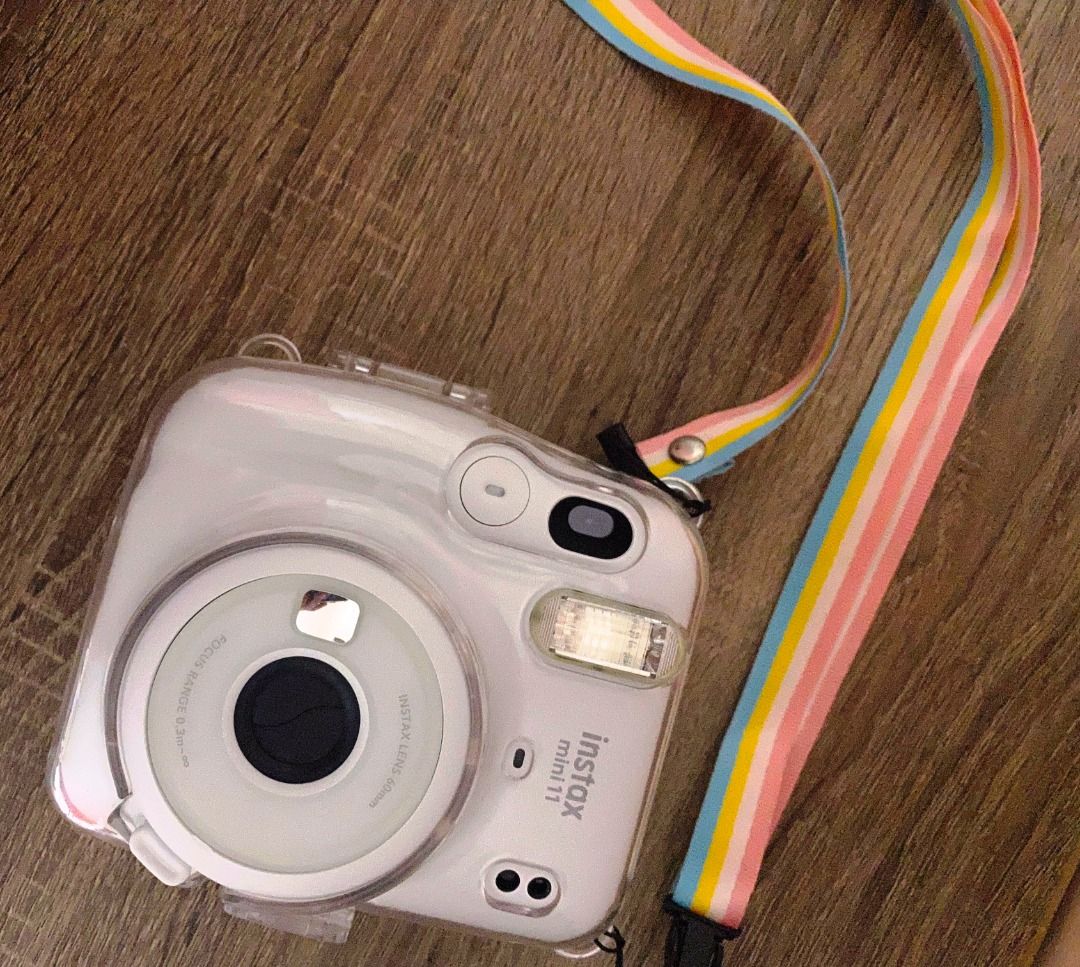 Instax Mini 11 White with Case, strap & 7 unused films (Category: Cameras) located in Mandaue City. Submitted by twylainavani (Listing ID 1387568064, Image 2). Description: Message me for more questions. .