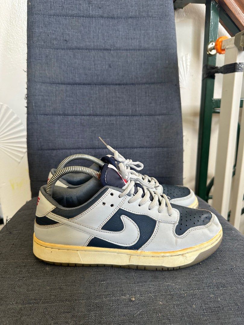 Nike Dunk Low College Navy Wolf Grey (Category: Sneakers) located in Quezon City. Submitted by jesscagungun (Listing ID 1387604902, Image 3). Description: Ukay bale po ito from US, so it needs cleaning. What you see is what you get. Nasa picture na po lahat ng details, thank you..
