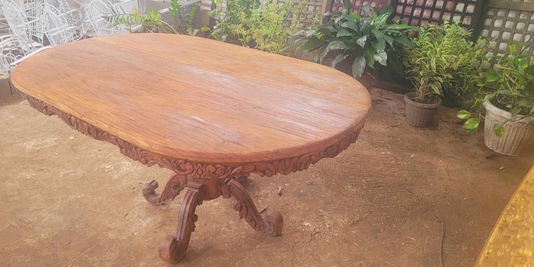 Old Oval Dining Set (Category: Tables & Sets) located in Rizal. Submitted by mommykiee (Listing ID 1387636868, Image 3). Description: Old Oval dining table Made of narra wood (3piece top) Leg made of tanguile wood Newly stripped and varnished Size: L61 W37 H30inch.