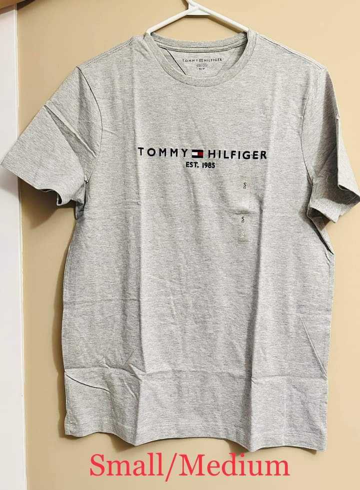 Original Tommy Hilfiger Mens Tshirt (Category: Tshirts & Polo Shirts ) located in Kalibo. Submitted by brandedboxedph (Listing ID 1387698155, Image 2). Description: ✨ Authentic Tommy Hilfiger Mens T-Shirt – straight from Canada ✔ 100% Original, High-Quality Fabric ✔ Comfortable & breathable – perfect for daily wear ✔ Classic fit for men ✔ Available in sizes: S / M ✔ Color: Gray ✔ Style: Crewneck ✔ Limited stocks – once sold out, no restock! Perfe