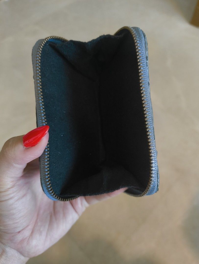 Python Skin Zip Around Wallet (Category: Wallets & Card Holders) located in Singapore. Submitted by slur (Listing ID 1387547222, Image 3). Description: - Genuine python skin wallet - Stylish zip-around design - Gorgeous blue-grey colour - Dark fabric interior - Perfect for cards and cash - Excellent condition - Unisex .