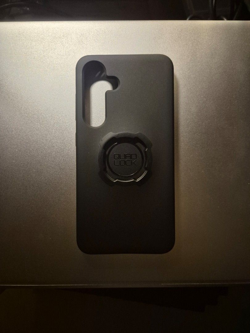 Quad Lock - Samsung S24 (Category: Cases & Sleeves) located in Quezon City. Submitted by offthesehands (Listing ID 1387716775, Image 3). Description: Brand: Quad Lock Color: Black Type: Samsung S24 (NON-MAG) Price: Bought it for P 1740.00, selling it for P1000.00 Usage: Only used it once to fit RFS: Bought the wrong case DM if interested | Will only entertain questions related to the item.