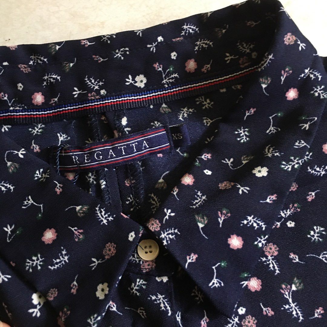 Regatta floral dress (Category: Dresses) located in Dagupan City. Submitted by einalem.declutters (Listing ID 1387613816, Image 3). Description: Brand: Regatta Size: XS Dress Design: Navy blue, floral patterned, button and tie dress Condition: never been used Mop: gcash/maya Mod: j&t/lbc Buyer will shoulder the shipping fee Send a message if interested .