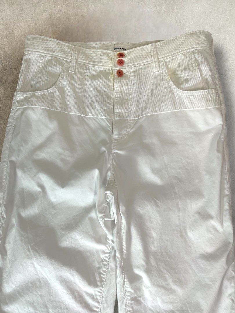 Ss2013 Undercover white double layered cotton trousers (Category: Activewear) located in Manila. Submitted by killzarchival (Listing ID 1387732110, Image 3). Description: Ss2013 Undercover white double layered cotton trousers *Condi:7/10 *Button bleed onto the crotch area but overall the pants is still in good condition with normal sign of using Size:4 Waist:34 Outseam:41 Inseam:29.5 Crotch:12 Thigh:12.5 Knee:9.5 Leg opening:7.5.
