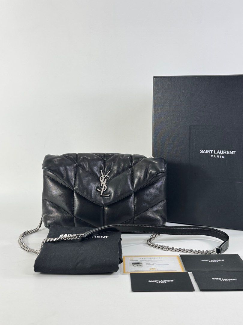 Ysl Loulou Puffer (Category: Luxury Bags & Wallets) located in Manila. Submitted by luxuryprelovedbagsby_by_agnes (Listing ID 1387594671, Image 1). Description: THE ICONIC LOULOU PUFFER IN A MINI VERSION. MADE OF SOFT NAPPA LAMBSKIN WITH CHEVRON QUILTING, IT FEATURES A SLIDING CHAIN FOR WEARING IT ON THE SHOULDER OR CROSSBODY. GROSGRAIN LINING LIGHT BRONZE BRASS HARDWARE MAGNETIC SNAP TAB INTERIOR ZIPPED POCKET TWO CARD SLOTS DIMENSIONS: 23 X 15.