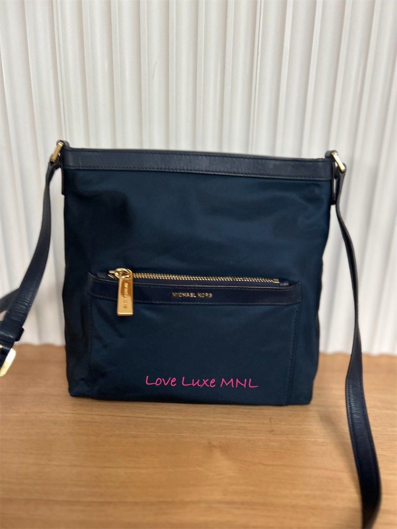Authentic Michael Kors Nylon Bag (Category: Luxury Bags & Wallets) located in Quezon City. Submitted by robstejonespaloma (Listing ID 1384379275, Image 1). Description: .