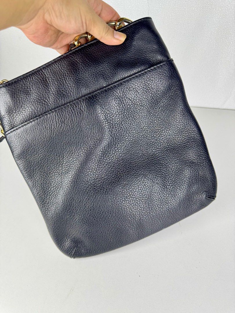 [Authentic] MK Michael Kors Sling Bag (Category: Luxury Bags & Wallets) located in Tabuk. Submitted by meksieclosetph (Listing ID 1384383720, Image 3). Description: Authentic Michael Kors Astor Sling Bag Condition: • Preloved • Issue: Tarnished hardware around the logo plaque • Otherwise in good condition (no major wear or damage on leather or structure) Dm for exact measurement .