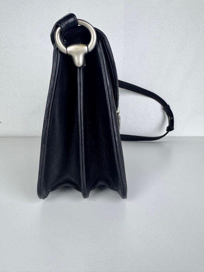[Authentic] Sting Ray Sling Bag (Category: Cross-body Bags) located in Tabuk. Submitted by meksieclosetph (Listing ID 1384387235, Image 3). Description: Authentic Stingray Leather Sling Bag – Like New • Material: Genuine stingray leather (exotic, durable, and water-resistant) • Color: Black with natural white stingray spine detail • Hardware: Silver-tone clasp lock closure • Strap: Adjustable leather strap for crossbody or shoulder wear • Interio