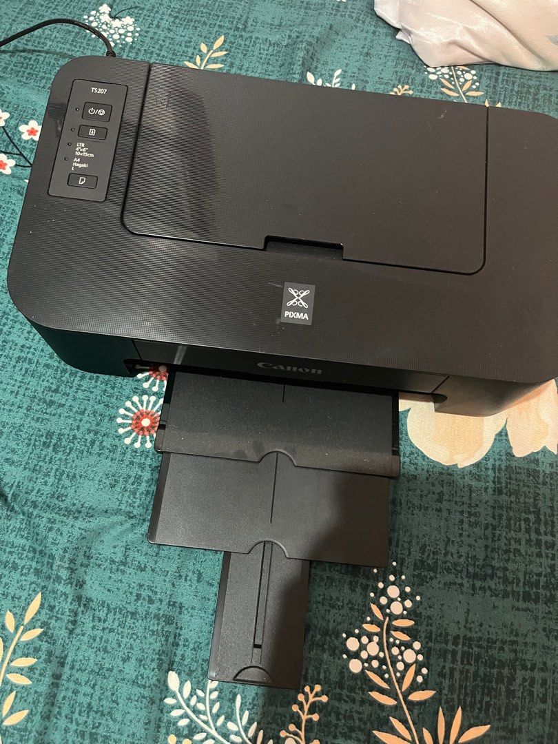 Canon Pixma TS207 (Category: Printers, Scanners & Copiers) located in Quezon City. Submitted by barbara___ (Listing ID 1384300670, Image 2). Description: Canon Pixma TS207. Printer only. No cartridge included. Working properly. No history of repairs. Minimal scratches on the surface as you can see on the images. RFS: Not being used at home. .