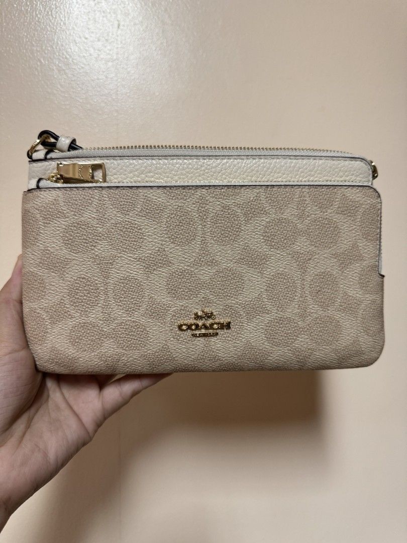 Coach pouch double zipped (Category: Luxury Bags & Wallets) located in Taguig. Submitted by Myclosetdeclutter (Listing ID 1384282595, Image 2). Description: Brand New from USA.. Inclusions: paper bag and care cards.