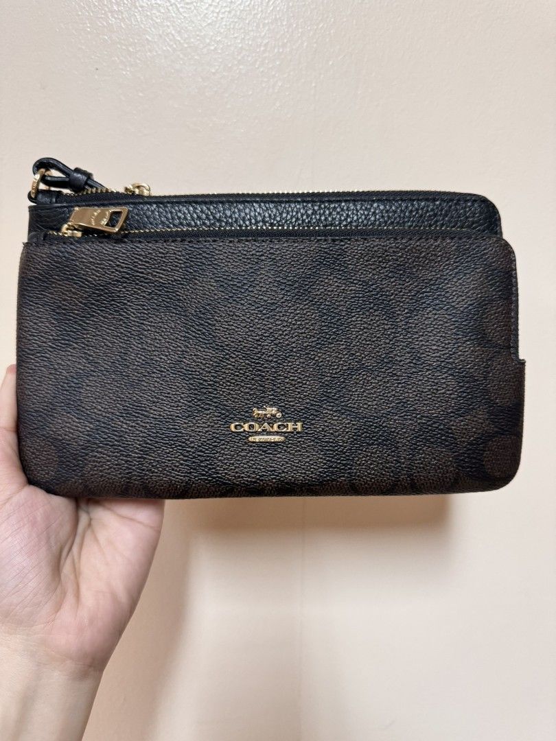 Coach pouch double zipped (Category: Luxury Bags & Wallets) located in Taguig. Submitted by Myclosetdeclutter (Listing ID 1384282595, Image 3). Description: Brand New from USA.. Inclusions: paper bag and care cards.