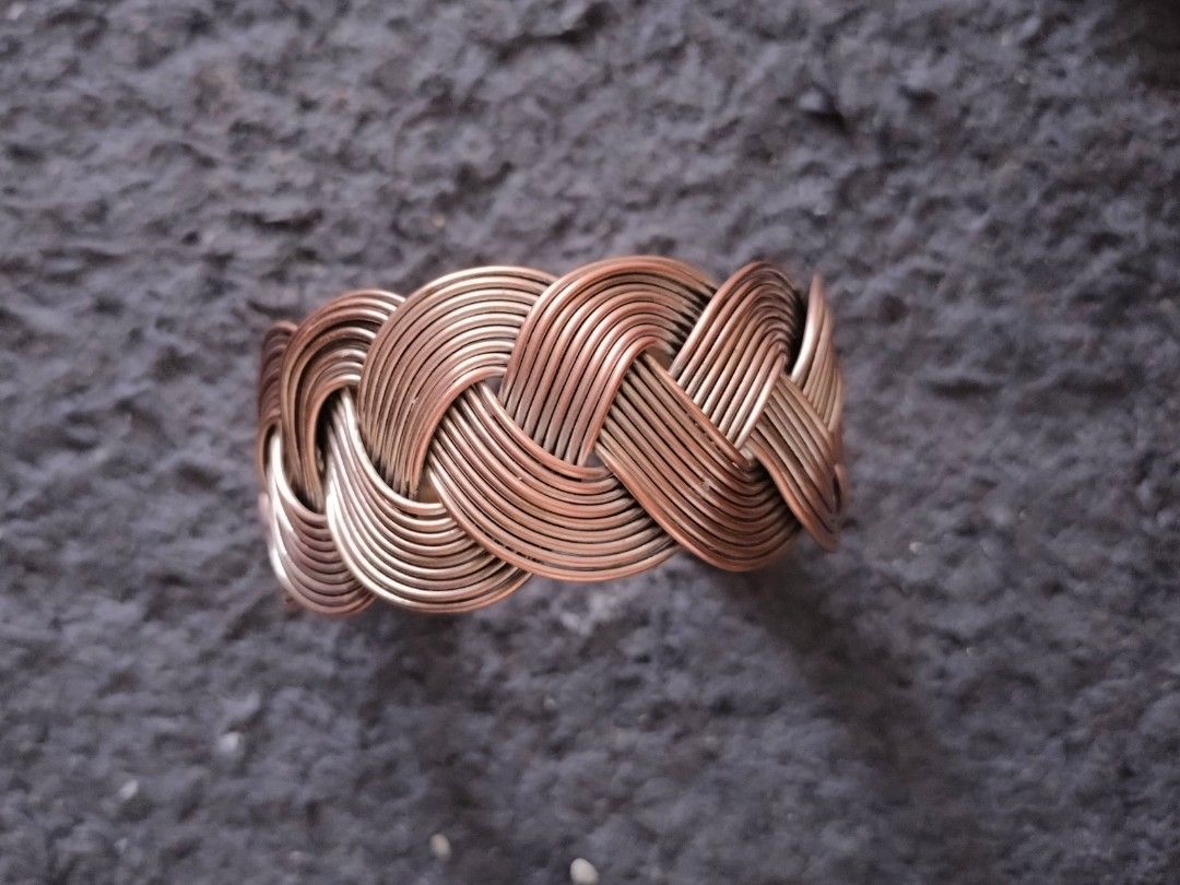 Copper Bangle (Category: Bracelets) located in Petaling Jaya. Submitted by stashnik (Listing ID 1384267136, Image 1). Description: Copper bangle Originally Plated with Silver. Scrubbed to show its antique colour. Not magnetic. No Rust. Some wear and tear. Adjustable. Approximately 3cm width,15 cm length..