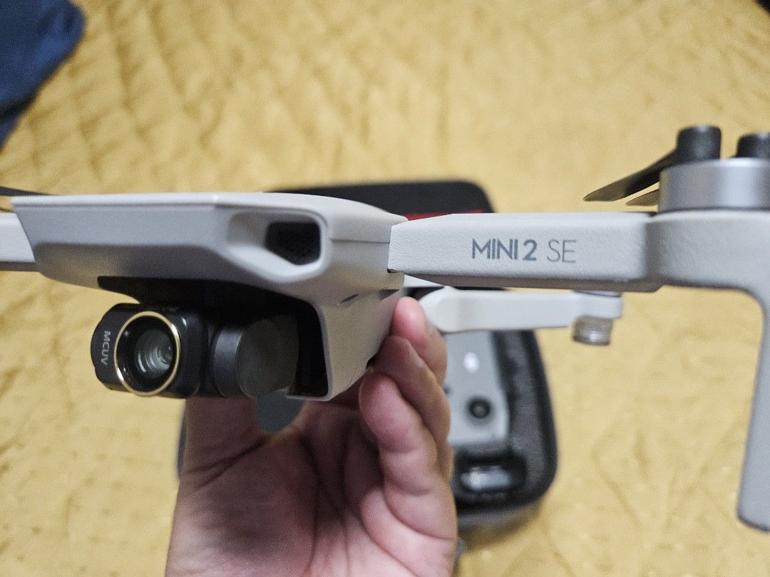 DJI Mini 2 SE (Category: Drones) located in Manila. Submitted by wrebbit001 (Listing ID 1384399774, Image 2). Description: Dji mini 2 se drone no issues what's included - drone unit - 2 good batteries 31and 8 cycles - will include 1 battery (bloated) this can still be repaired - charger - foam case - ND filters - cables - extra propellers - extra control sticks - lens hood - landing gear - original box fixed price.