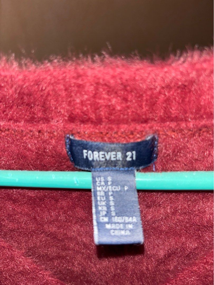 Forever 21 Red Brushed Fur V-Neck Sweater (Category: Longsleeves) located in Cavite. Submitted by helloize (Listing ID 1384284782, Image 2). Description: Used only once. In really good quality 💯 Soft frabic and unique finds .