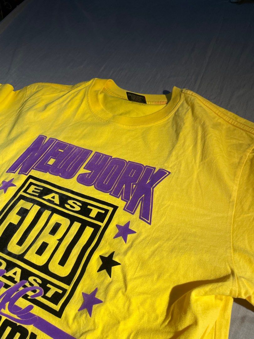 FUBU TSHIRT 2000s style (Category: Tshirts & Polo Shirts ) located in Makati City. Submitted by berto01 (Listing ID 1384409236, Image 2). Description: FUBU TSHIRT VERY GOOD CONDITION no issues Yellow color rate 10/10 L on tag .