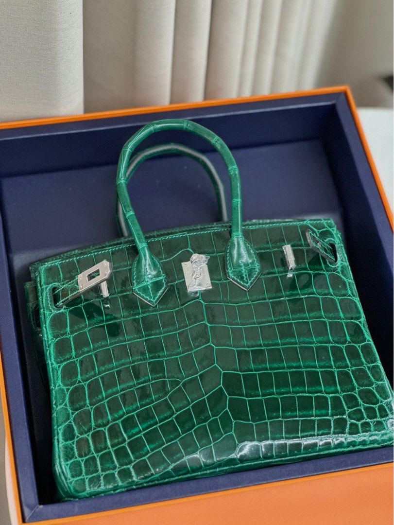 Hermes Birkin Crocs Green with Palladium Hardware (Category: Luxury Bags & Wallets) located in Pasig City. Submitted by wmsbags_2 (Listing ID 1384379067, Image 2). Description: Available ❗️ VIP HANDMADE ✅Perfect workmanship ✅Fully hand stitched ✅Fine stamp & Code ✅100% Hardware materials structured ✅Real Leather ✅We do deliver (any) ✅ or meet up ( metro manila area) ✅We shipp all nationwide ✅Complete Inclusion MODE OF PAYMENT 📌CREDIT CARD & Cash