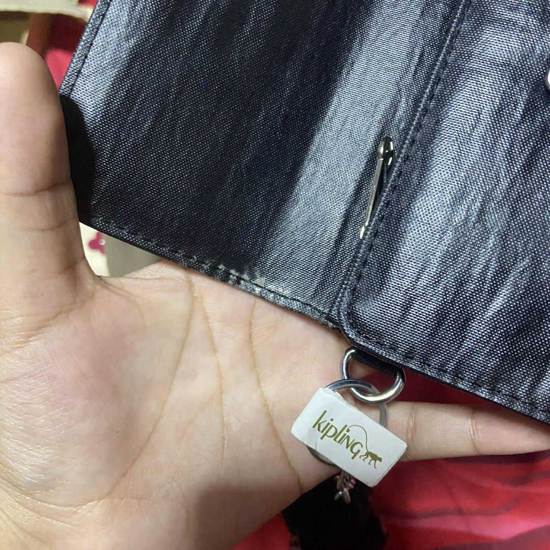 Kipling Long Nylon Wallet (Category: Luxury Bags & Wallets) located in Manila. Submitted by johnsebast21651 (Listing ID 1384347433, Image 2). Description: •Authenthic •Nylon Material •Still Negotiable.