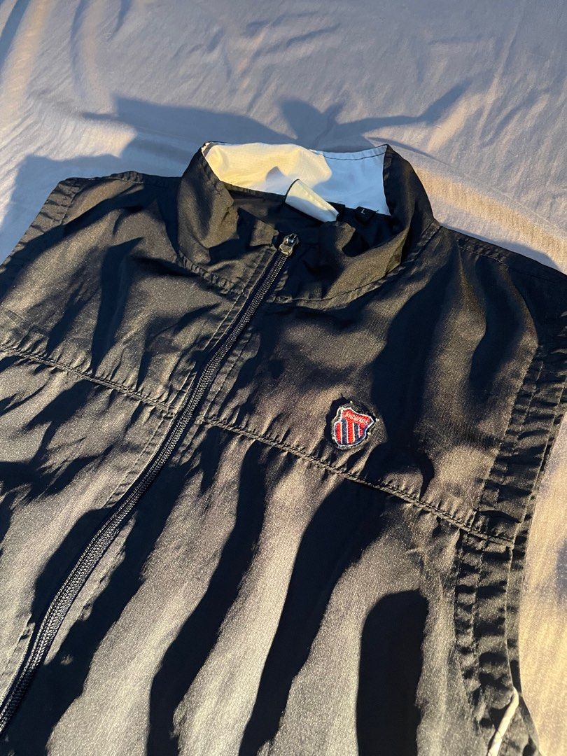 Kswiss vest (Category: Activewear) located in Makati City. Submitted by berto01 (Listing ID 1384408851, Image 1). Description: kswiss vest in good condition issue: puller silicone got cut but working very well L on tag.
