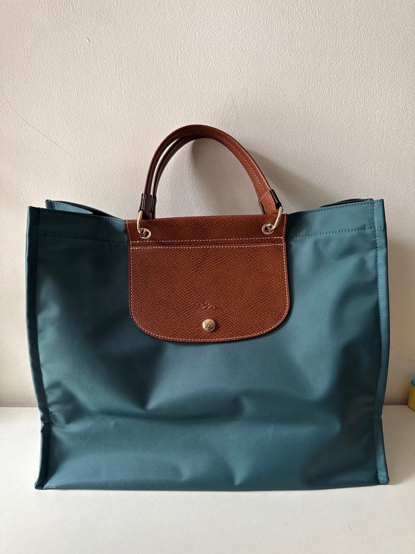 Longchamp L Tote Bag Cedar color (Category: Luxury Bags & Wallets) located in Cebu City. Submitted by simplyjoyce (Listing ID 1384291614, Image 1). Description: Brandnew and Onhand Longchamp L Tote Bag Cedar color Store Fresh with receipt 100% original or triple your money back 21,000php Cebu City .