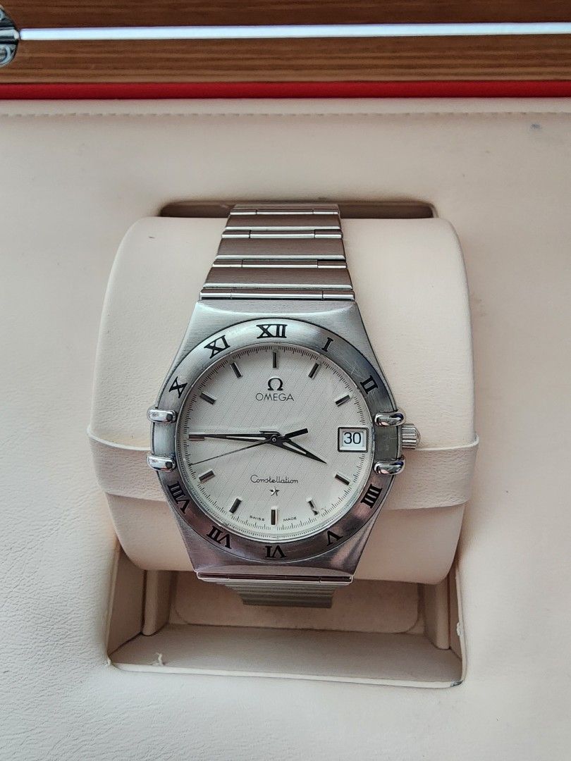 Omega Constellation Watch (Category: Luxury Watches) located in Manila. Submitted by camar195 (Listing ID 1384392626, Image 1). Description: OMEGA CONSTELLATION WATCH Movement: Quartz CASE Case Material: Steel Case diameter: 33.5 mm Thickness: 8 mm Water resistance: 5 ATM Bezel material: Steel Crystal: Sapphire crystal Dial: Silver Dial numerals: No numerals BRACELET/STRAP Bracelet material: Steel Bracelet color: Steel Clasp: Fold clasp Clasp mat