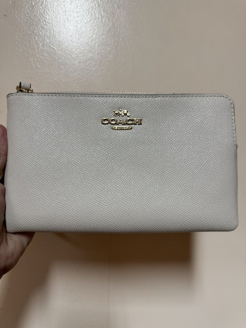 Pouch (Category: Luxury Bags & Wallets) located in Taguig. Submitted by Myclosetdeclutter (Listing ID 1384282932, Image 3). Description: Brand New from USA Inclusions: Paper bag and care cards.