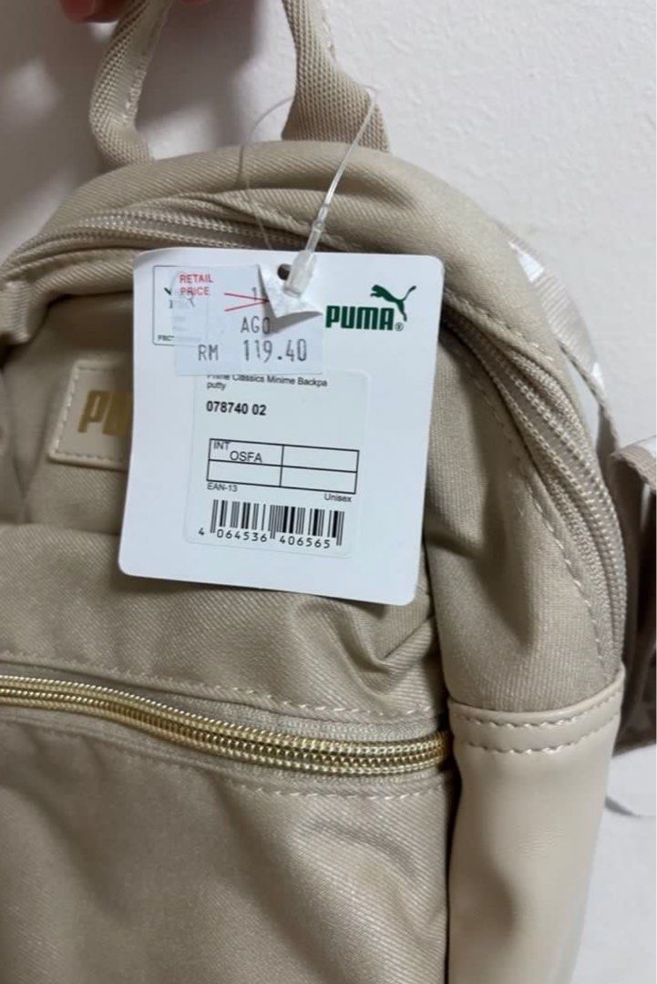 Puma backpack (Category: Backpacks) located in Singapore. Submitted by kyyrr (Listing ID 1384422643, Image 4). Description: Brand new with tag still on, no defects and never used before. Unisex backpack with compartments..